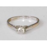 An 18ct white gold diamond solitaire ring, the claw set brilliant weighing approx 0.2 carats, 1.