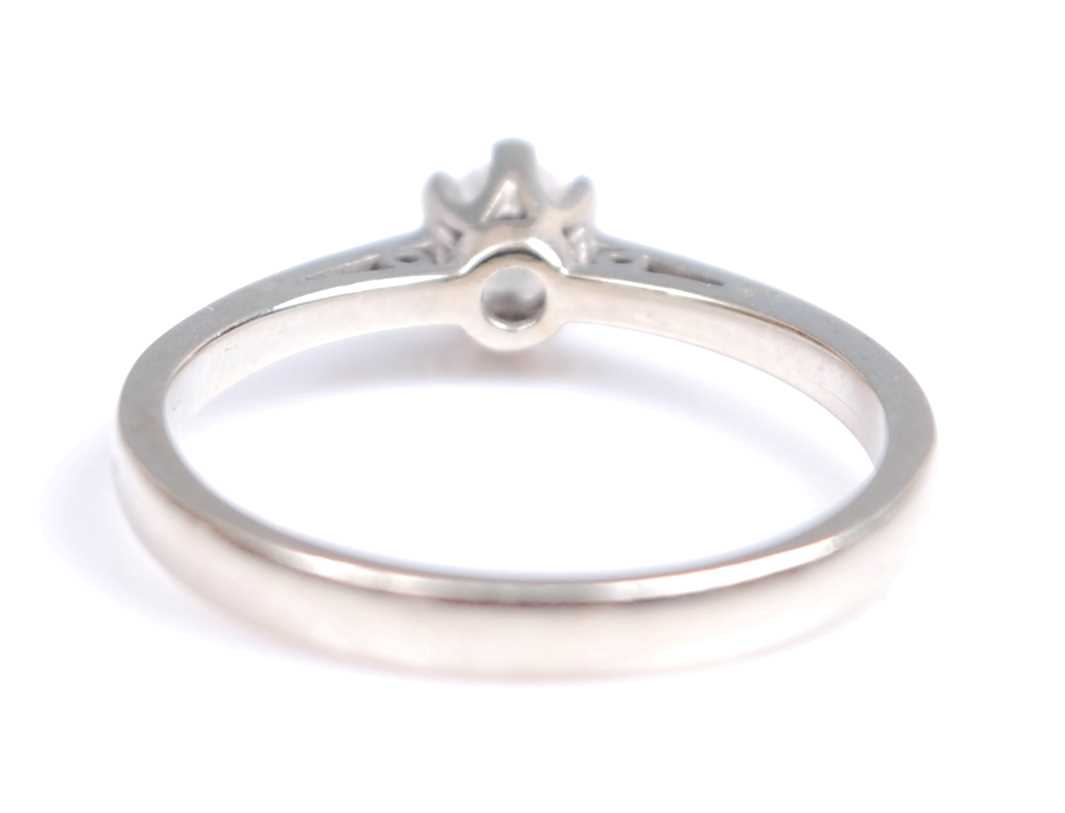 A 9ct white gold single stone diamond ring, comprising a round brilliant cut diamond in a six claw - Image 3 of 4