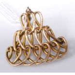 A yellow metal brooch, of interwoven triangular form, unmarked but tests as 14ct, 5.9g, w.35mm, on