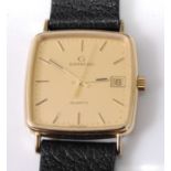 A gent's Garrard & Co 9ct gold cased quartz dress watch, having signed gilded dial with baton