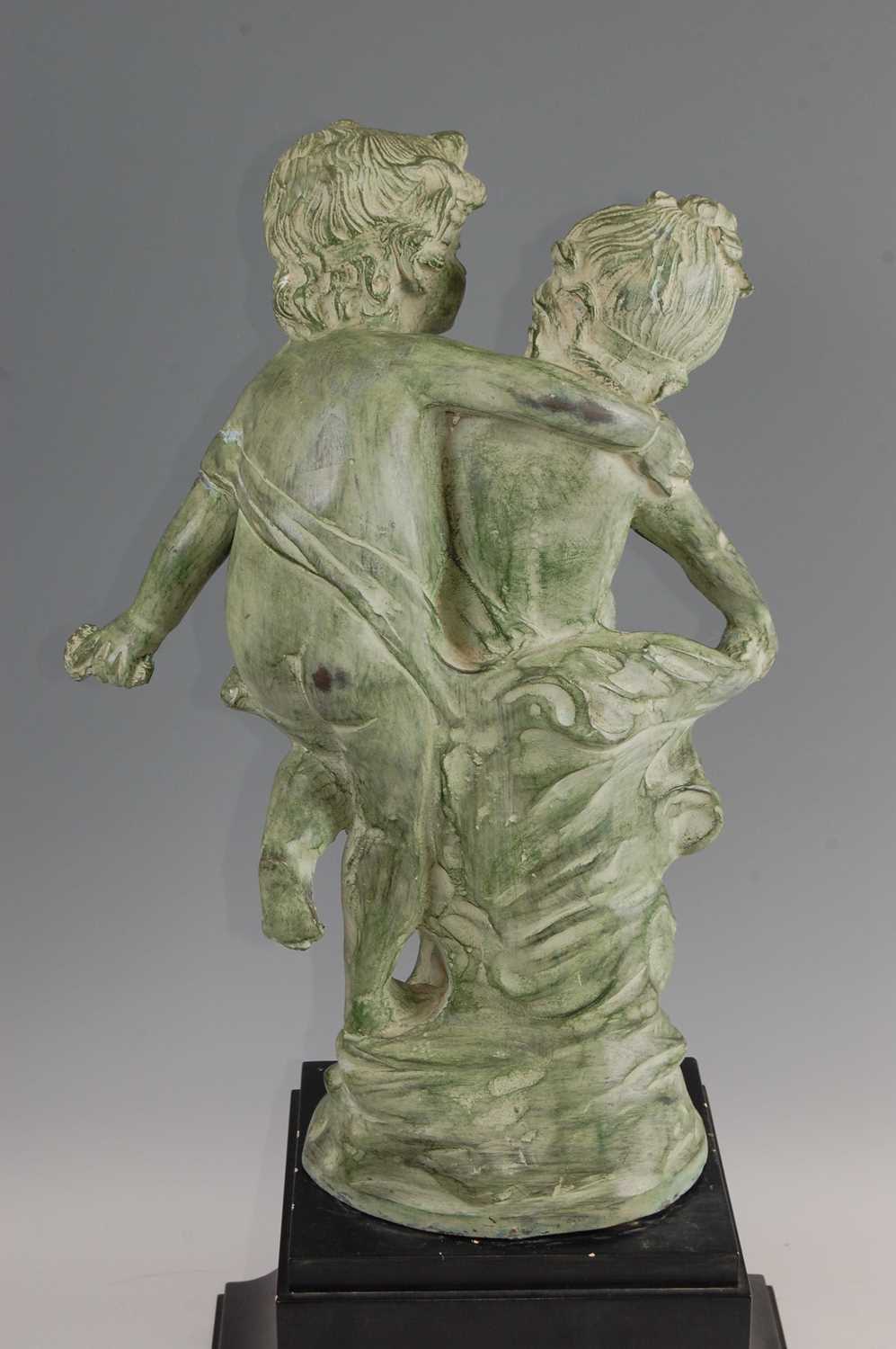 A large contemporary green patinated bronze model of a young boy and girl, each semi-nude, in - Image 3 of 4