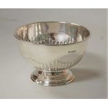 An Edwardian silver footed bowl, having half-fluted decoration, 6.6oz, Sheffield 1904, dia.15cm