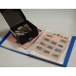 A schoolboy stamp collection, to include Christmas stamps from around the world; together with
