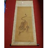 A Japanese scroll watercolour depicting a tiger