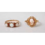 Two 9ct yellow gold rings, comprising an oval shell cameo depicting a figure of a lady within a rope