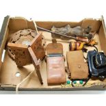 A box containing a collection of items, to include treen and vintage cameras