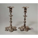 A pair of 18th century style white metal multi-knopped candlesticks with detachable sconces, 36oz,