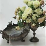 A Rococo Revival silver plated boat shaped table centrepiece, with applied mask ends (for re-
