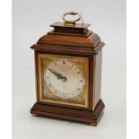 A mahogany cased Elliot mantel clock, retailed by Garrard & Co Ltd, having signed silvered dial, h.