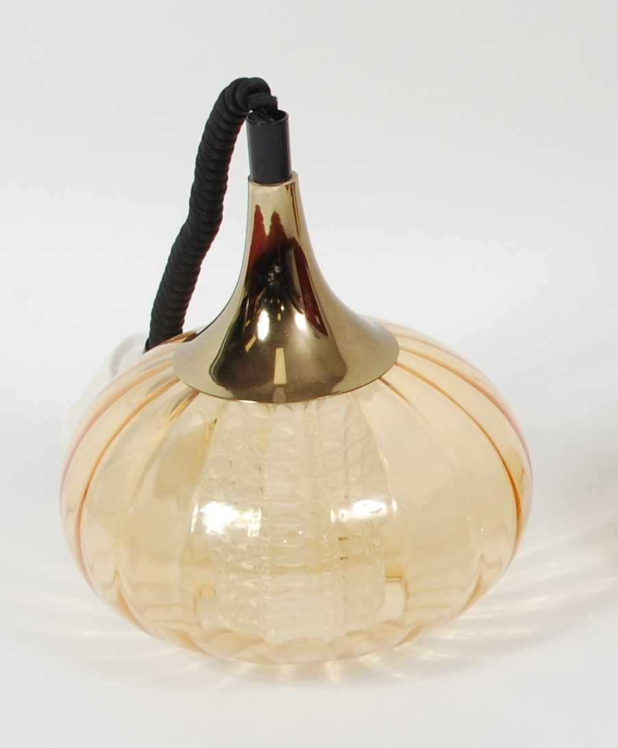 A 1960s amber glass onion shaped hanging pendant ceiling light, having a metal attachment, plastic - Image 2 of 2