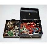 A Japanese lacquered box and contents, mainly being costume jewellery to include beaded necklace,