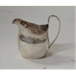 A late Georgian silver and engraved cream jug, of helmet form, 2.6oz, London 1808, h.10cmCondition