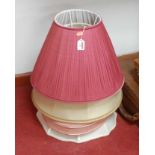A pink pleated silk light shade; together with three other light shades (4)