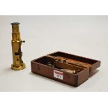 A 19th century brass monocular microscope, cased