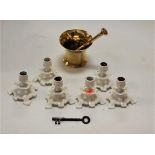 A set of six Victorian style cast metal dwarf candlesticks; together with a heavy turned brass