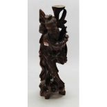 A Far Eastern carved hardwood peasant figure, h.59cm