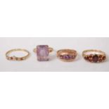 Four 9ct yellow gold rings, comprising a rectangular amethyst example, weight estimated as 7.30