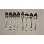 A set of eight George V silver coffee spoons, each having monogrammed terminal, by Walker & Hall,