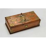A late Victorian oak and brass mounted table-top cigar/cigarette box, of rectangular form, having