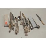 A collection of loose mainly silver plated flatware, to include tea knives, butter knives,