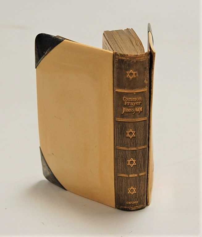 An early 20th century leather bound Book of Common Prayer, with ivory boards and silver mounts