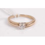 A 9ct gold diamond solitaire ring, the four claw set brilliant weighing approx 0.2 carats, 2g,