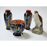 A pair of Shelley black ground and exotic bird decorated vases, h.17.5cm; together with a matching
