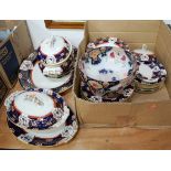 A Victorian ironstone part dinner service, on a white ground within blue floral borders and