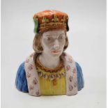 An earthenware tin-glazed bust of a Nobleman, marked to base and with paper label to underside
