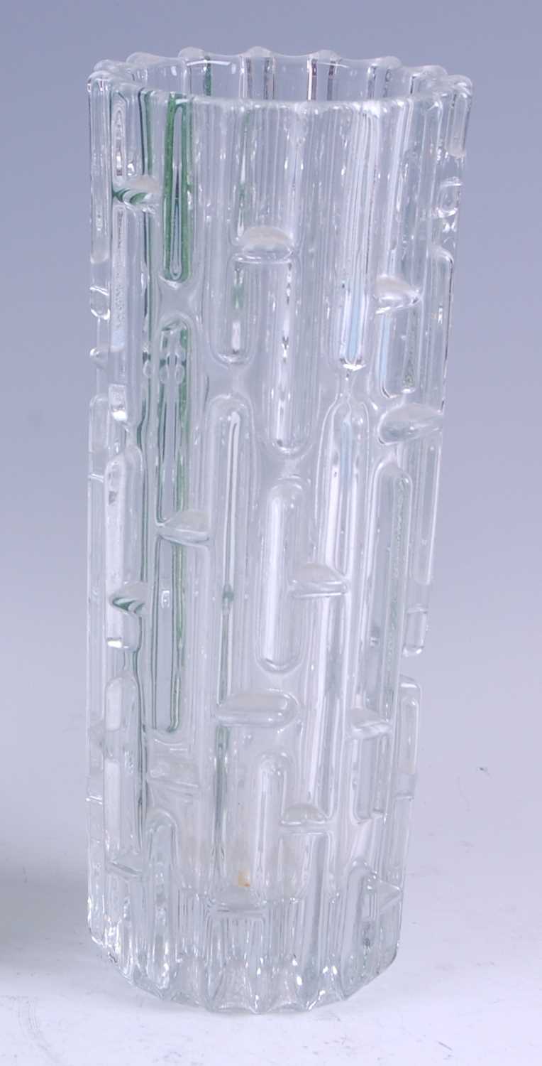 A 1960s clear moulded art glass vase, of cylindrical form, with outer raised geometric stylised