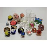 A box of miscellaneous glass paperweights to include Matt Jonasson Swedish crystal example etc