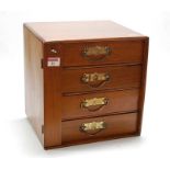 A late Victorian walnut flight of four collectors drawers, with locking side flap, h.30.5cmCondition