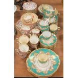 A Victorian part tea service, on a turquoise ground heightened in gilt; together with one other