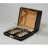 A cased pair of Art Deco silver six division toast-racks, 4.2oz, Birmingham 1913, w.11cmCondition