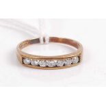 A 9ct gold diamond half eternity ring, the seven channel set brilliants weighing approx 0.4 carats