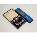 A silver handled cake knife, boxed; together with a set of six silver plated teaspoons