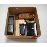 A box of miscellaneous items, to include various clothes brushes, photographic portrait of a lady,