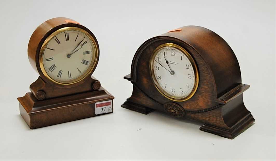 T.W. Long & Co of Cardiff - an oak cased mantel clock, circa 1930, h.15cm; together with a late