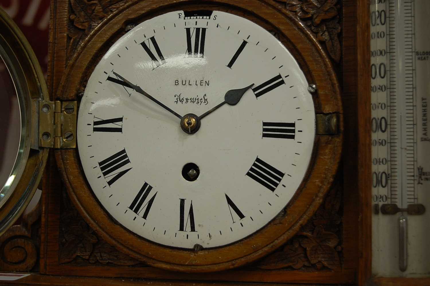 A Victorian carved oak desk weather station, inset with clock and barometer, with central - Image 5 of 9