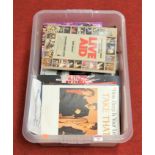 A box of miscellaneous pop music memorabilia, to include The Greatest Show on Earth Live Aid book,