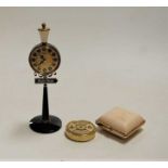 A novelty clock in the form of a Parisian street lamp, the clock with alarm, the lamp post with