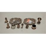 A pair of Edwardian silver bonbon dishes, each repousee decorated with floral swags and bows;