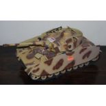 A New Millennium Toys plastic scale model of a German tank, finished in tan camouflage