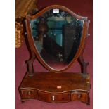 A 19th century mahogany and boxwood strung shield shaped swing dressing table mirror, raised on