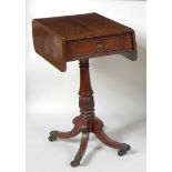 A Regency mahogany pedestal needlework table, the top having dropflaps over end frieze drawer and