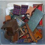 A collection of mainly wooden construction dolls house furniture