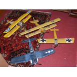 Four various large-scale static display model aircraft