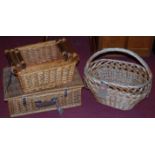 Contemporary wicker wares, to include; a picnic hamper (lacking contents), three graduated