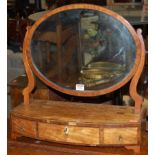 A 19th century satinwood and rosewood crossbanded oval swing dressing table mirror, raised on