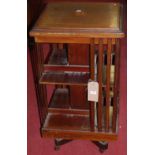 An Edwardian mahogany and satinwood inlaid square eight-division revolving bookcase, h.88.5cm, w.